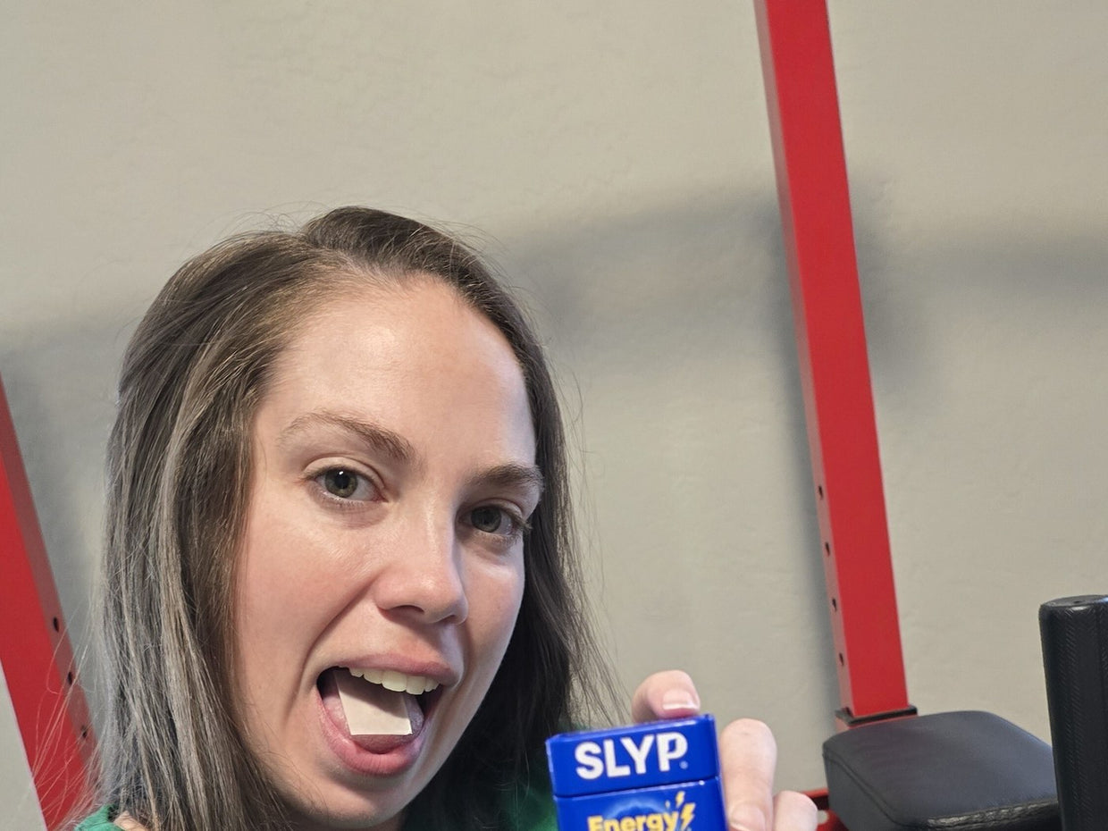 Person snapping into focus at their desk after taking a Slyp energy strip