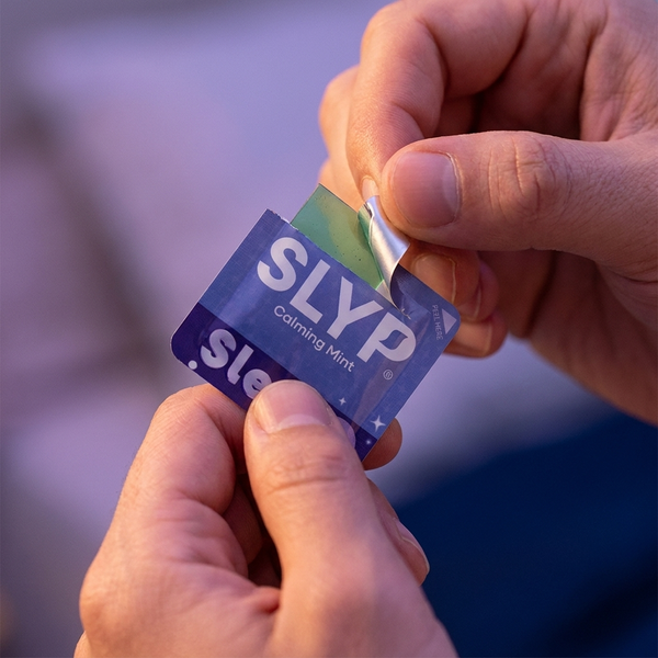 Peeling open a Slyp foil packet